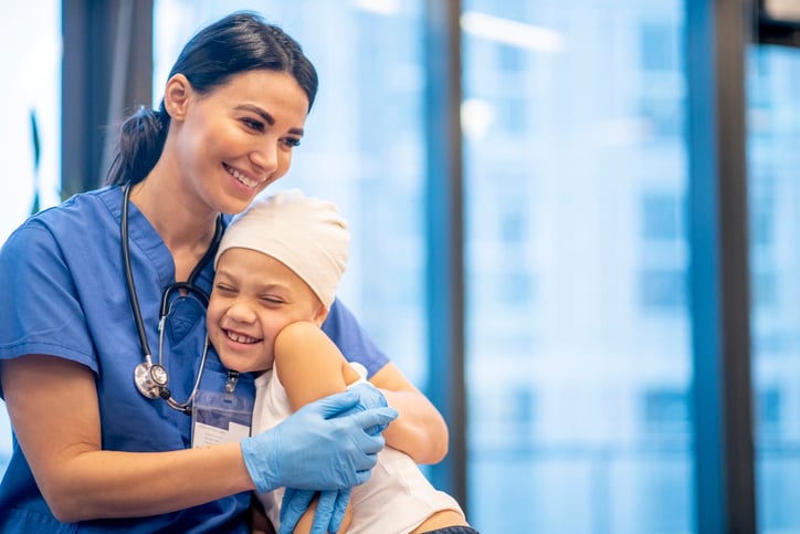 nurse-hugging-sick-child