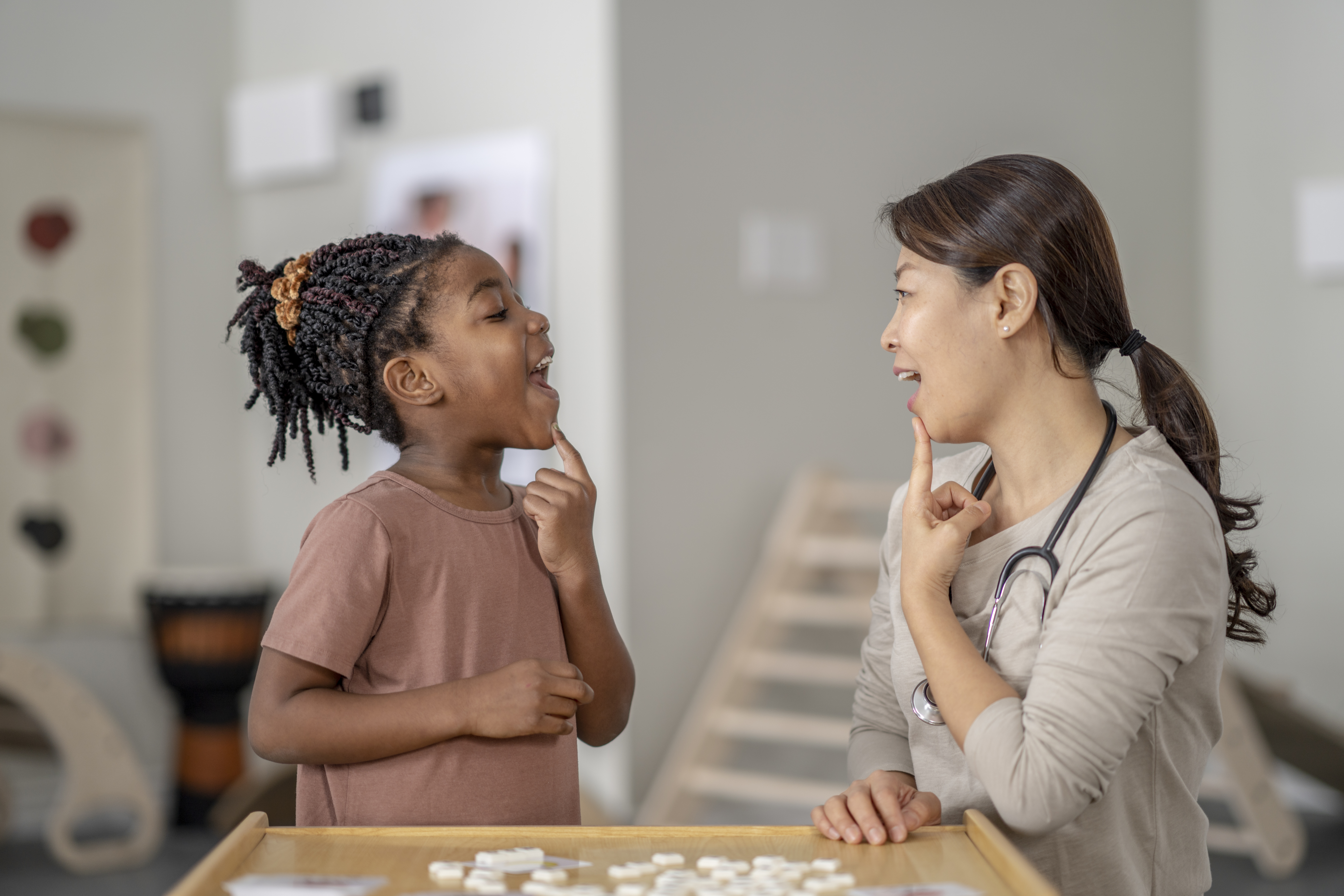 speech-language-pathologist-helping-child-patient