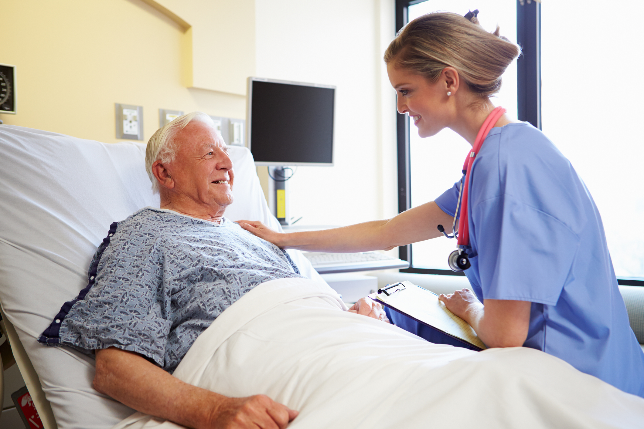 healthcare-worker-talking-to-patient