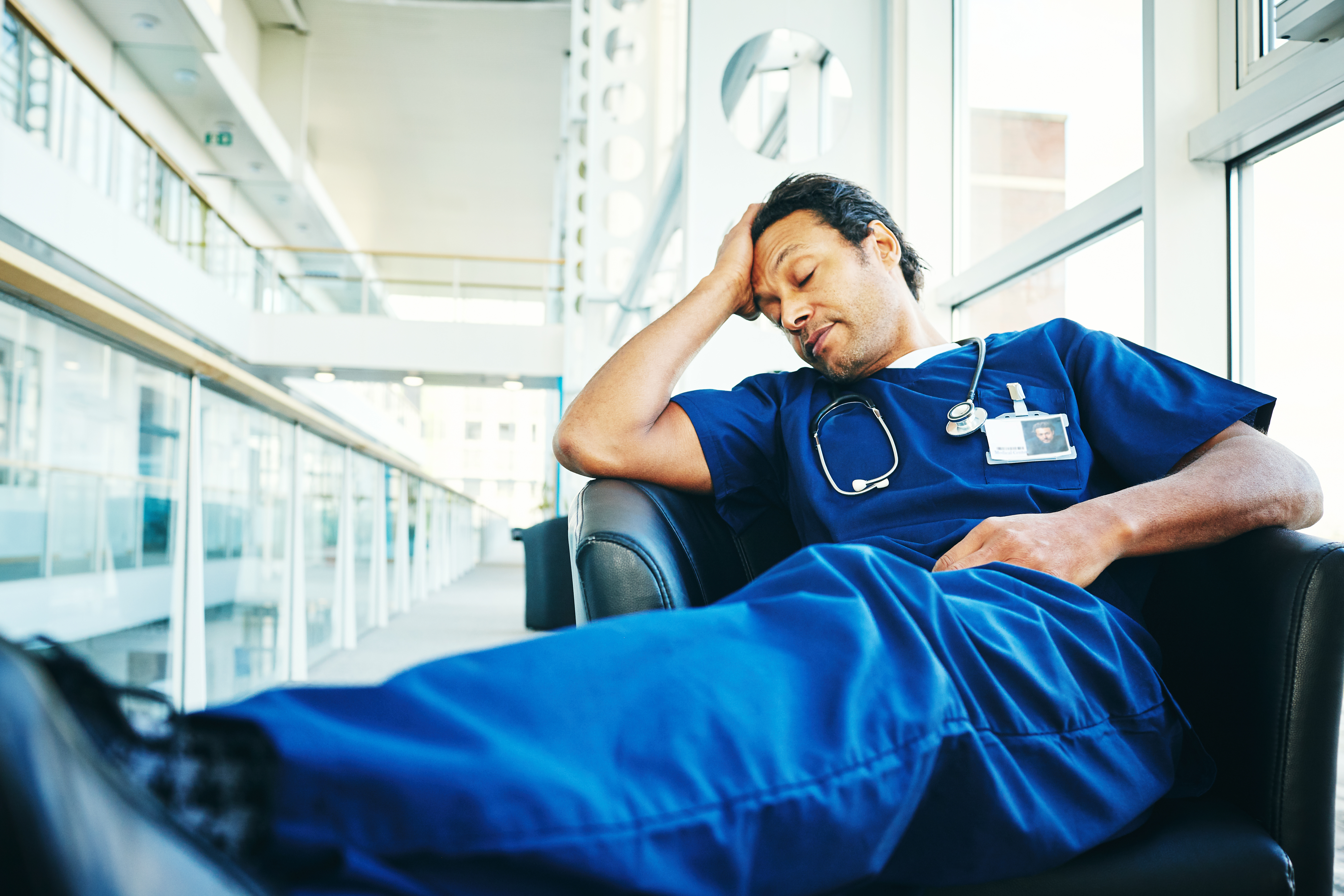 male-staff-nurse-taking-a-break-from-his-shift
